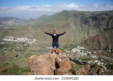 A Male Hiker Celebrating And Enjoying The View From Gran Canaria In Camino De Tamadaba