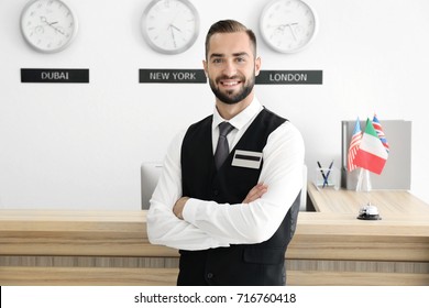 Male Hotel Receptionist At Workplace