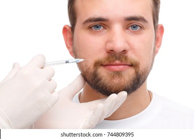 The Male Is Injected With Botox On The Cheek Near The Mouth. Isolated Over White Background.