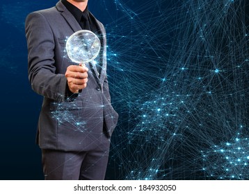 Male Inspecting Virtual Network Structure  By Magnify Glass