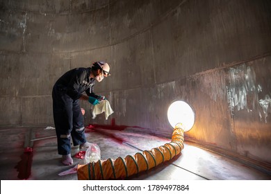 Male Into Work Inspection Process Chemical Color Paint  Weld Cleaning Red At The With Stainless Steel  Blower Fresh Air Into Oil Storage Tank Confined Space