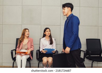 Male Job Seeker Went Report His Own Profile As The First To Apply For Job And Inquired About His Resume In An Orderly And Respectful Manner : Two Women Sit And Wait For An Interview.