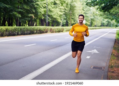 Male jogger running in park