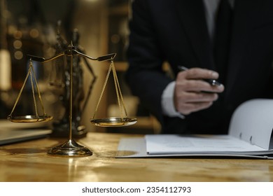 Male lawyer or judge consult having team meeting with client, Law and Legal services concept.. - Shutterstock ID 2354112793