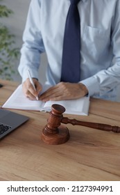 a male lawyer at a meeting with a client, legal advice online. resolution of disputes of the family code during divorce and division of property. work as a lawyer in a law firm or as a judge. appeal - Shutterstock ID 2127394991