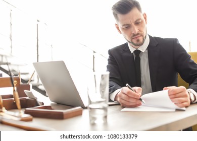 Male Lawyer Working In Office