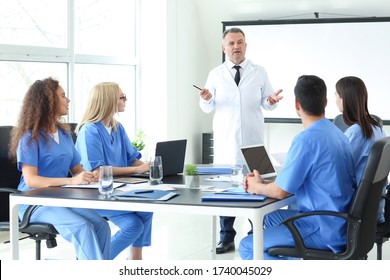 Male Lecturer Teaching Medical Students In University