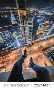 Male Legs Of Rooftop Of Millennium Plaza Hotel Dubai On Sheikh Zaid Highway, Tower, Al Yaqoub Tower, Capricorn Tower, Maze Tower, Dubai, UAE At Night