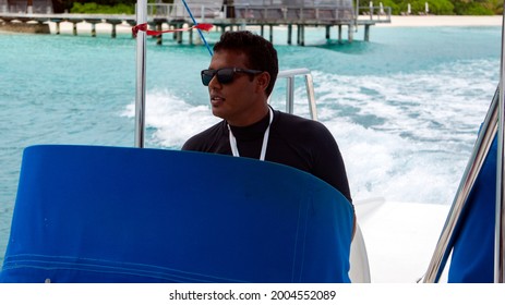 Male, Maldives, 07.07.21
A Man Drives A Speedboat