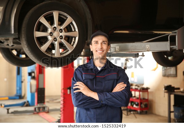 Male mechanic in car
service center