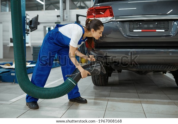 Male
mechanic prepares for inspection, car
service