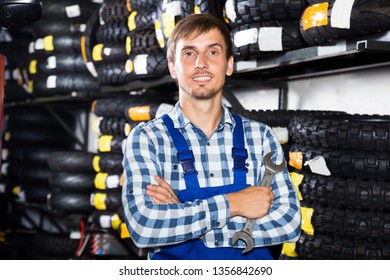 male mechanic working in auto repair shop