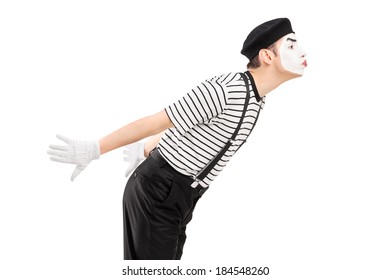 Male mime artist gesture kissing isolated on white background