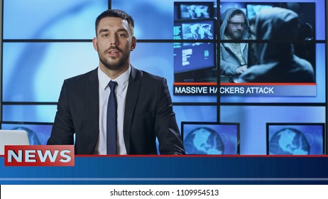Male News Presenter Speaking About Massive Hacker Attack