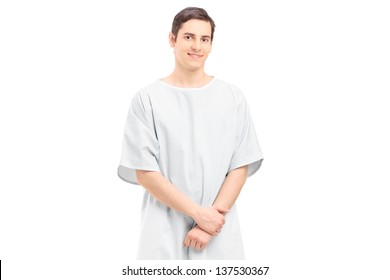 A Male Patient In A Hospital Gown, Isolated On White Background