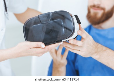 Male Patient At Hospital Using Virtual Reality Glasses