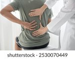 Male patients consulted physiotherapists with Low back pain for examination and treatment. Rehabilitation physiotherapy concept.