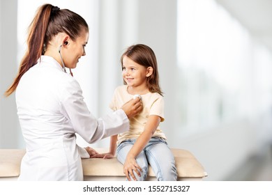 Male Pediatrician Hold Stethoscope Exam Child Boy Patient Visit Doctor With Mother, Black Paediatrician Check Heart Lungs Of Kid Do Pediatric