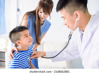  Male pediatrician hold stethoscope exam child boy patient visit doctor with mother - Powered by Shutterstock