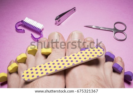 Male pedicure, nail file, scissors