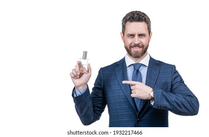 Male Perfumery. Copy Space. Businessman Point Finger On Bottle Of Perfume. Mens Fragrance Smell. Successful Guy Suggest Fashion Cologne Bottle. Handsome Man Choose Perfume. Masculine Cosmetics.