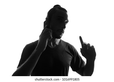 Male Person Silhouette Use Mobile Phone,,back Lit Isolated On White