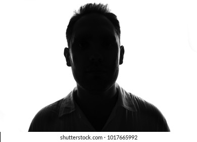 Male person silhouette,back lit over white - Shutterstock ID 1017665992
