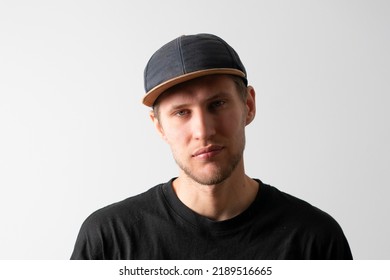 A Male Person Wearing Blank Simple Baseball Snapback Hat Mockup Copy Space Template