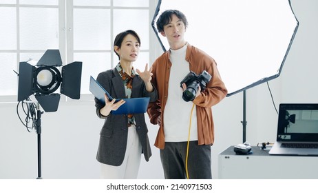 Male Photographer And Female Designer