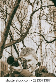 Male Photographer In New York City, Park And Buildings On The Background