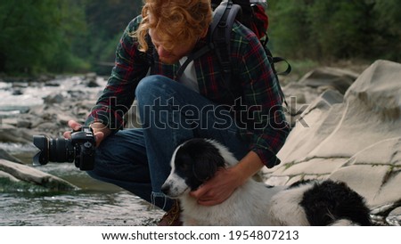 Similar – Image, Stock Photo Young hiker in river landscape