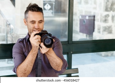 Male Photographer Taking Picture