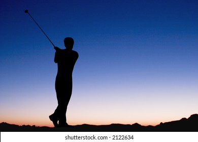 Male playing golf af dawn - Powered by Shutterstock