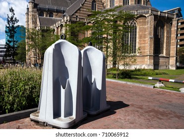 Male portable temporary urinal toilets near Cathedral of Saint-Lorentzkerk. Rotterdam, Netherlands