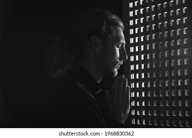 Male Priest In Confession Booth