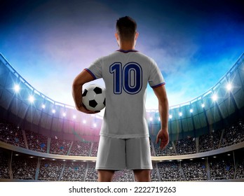 Male professional soccer player wearing an USA national team white jersey with the number ten on the back entering the stadium full of fans for a match. - Powered by Shutterstock