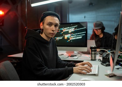 Male programmer applying anti-terror software in computer