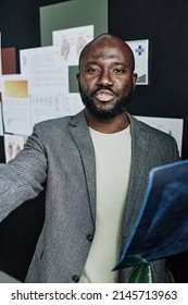 Male Radiologist Working With X-ray Images