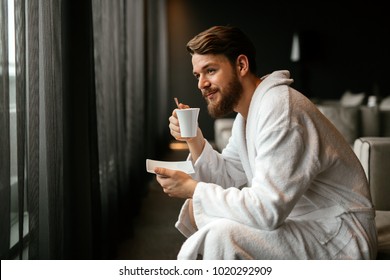 Male relaxing while drinking tea