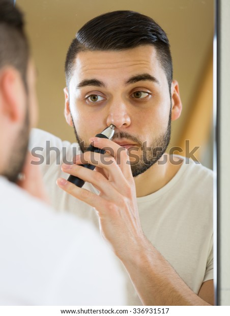 Male Remove Hair His Nose Ears Stock Photo Edit Now 336931517