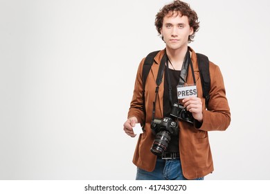 Male reporter holding card with the word press and giving blank card isolated on a white background - Powered by Shutterstock