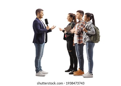 Male Reporter Interviewing A Group Of Young Students Isolated On White Background