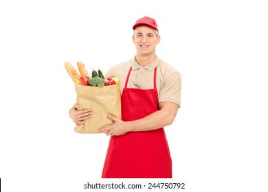 Male Retail Worker Holding A Grocery Bag Isolated On White Background