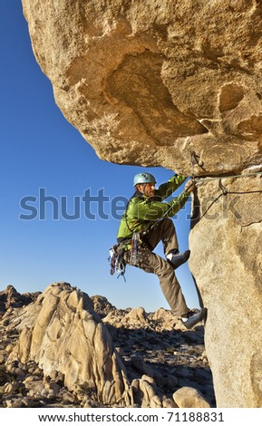 Similar – Image, Stock Photo Rock climber clinging to a cliff.