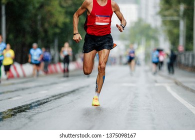 Male Runner Leader Of City Marathon Race Run In Rain