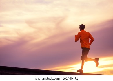 Male Runner Silhouette, Man Running Into Sunset, Colorful Sunset Sky 