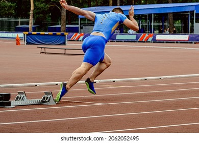 male runner start sprint race in athletics