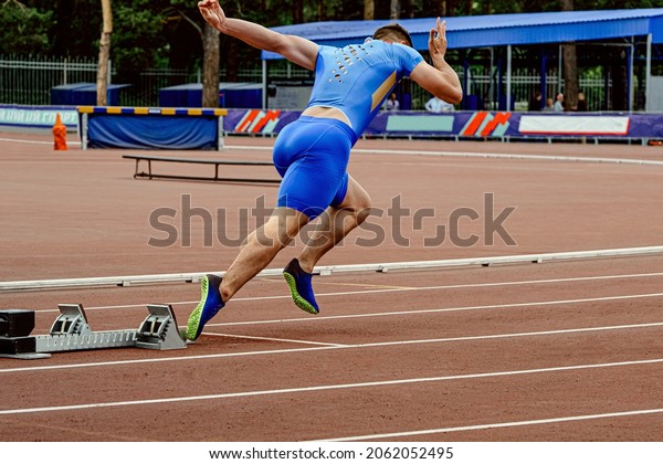male runner start\
sprint race in athletics