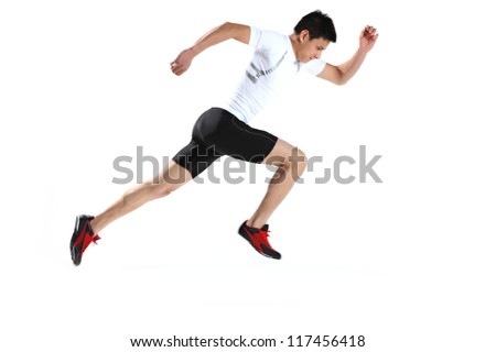 Male runner in starting blocks