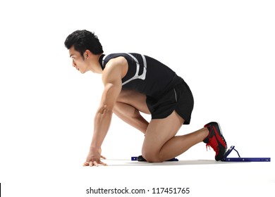 Male Runner In Starting Blocks, Close-up